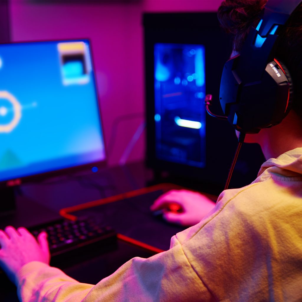 Boy Plays Computer Game at Home, Gaming Addiction